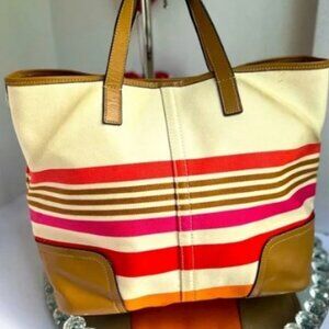 COACH Stylish canvas tote bag featuring vibrant stripes.